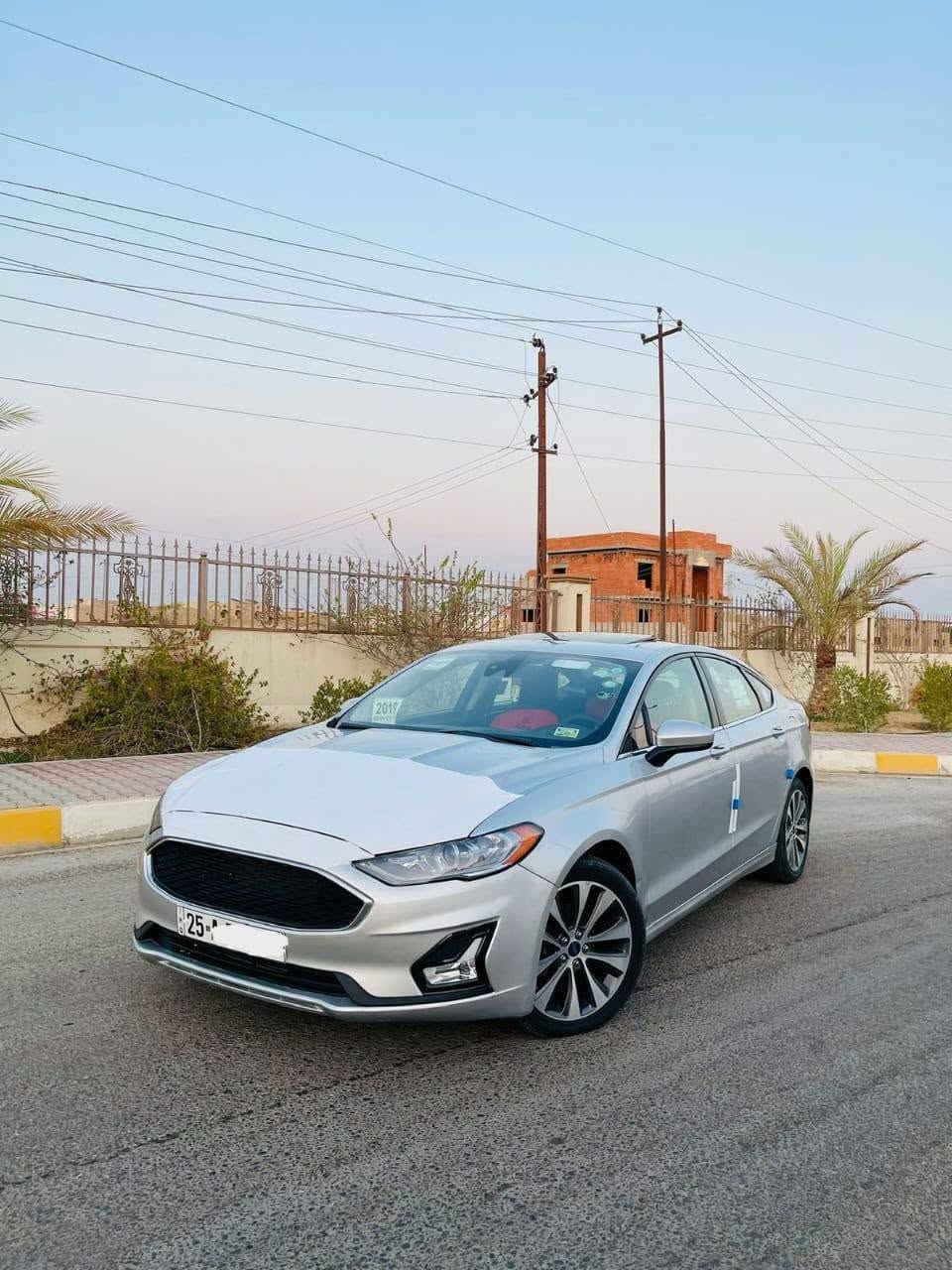 السلام عليكم…الحلال للبيع
 بسعر 109$ورقه اعتذر عن الاقساط 
فورد فيوجن 2019 SE ايكو بوست امريكي فووول 1/1
 لون رصاصي سلڤري مميز جداً  
كير اوتوماتيك  بوصله بدون عيب
محرك 2000 تنفس طبيعي 4سلندر المرغوب بدون فتح بدون عيب (يعني مو تيربو )
❇️مواصفات فوول 1/1 للاخير❇️
بصمه تشغيل وابواب وصندوق
فتحه سقف زجاج 
رادار امامي وكامره 
رادار جانبي 
نظام سبورت S 
دبل كزوز 
شفتات ستيرن كير رياضي
داخل اسود ملكي جلد
كشن السايق والراكب كهرباء 
قطعتين تبريد
شاشه كار بلي حجم كبير وكامره دواره
كروس سرعه
تحكم ستيرن 
عداد ديجتل ودبل شاشه عرض اعطال
بلوجكترات 
حساسات خلفيه
بك لايت ليد
لايت عدسه زينون بلادي 
ويل كب 18 كروم بلادي
تبريد ثلج 
وبعد بيها هوايه مواصفات …. 

🔴سياره جاهزه من كلشي تشغل وتطلع 
السياره بيها صبغ جاملغ السكن  ونص الباب ملاون كلير فقط بدون اي دواخل بدون تبديل شرط السونار

رقم 25 انكليزي الجديد / تحويل بنفس اليوم 
السعر 109$ ورقه وبيها مجال بسيط
🔺مكاني تكريت القادسيه
***********
***********
