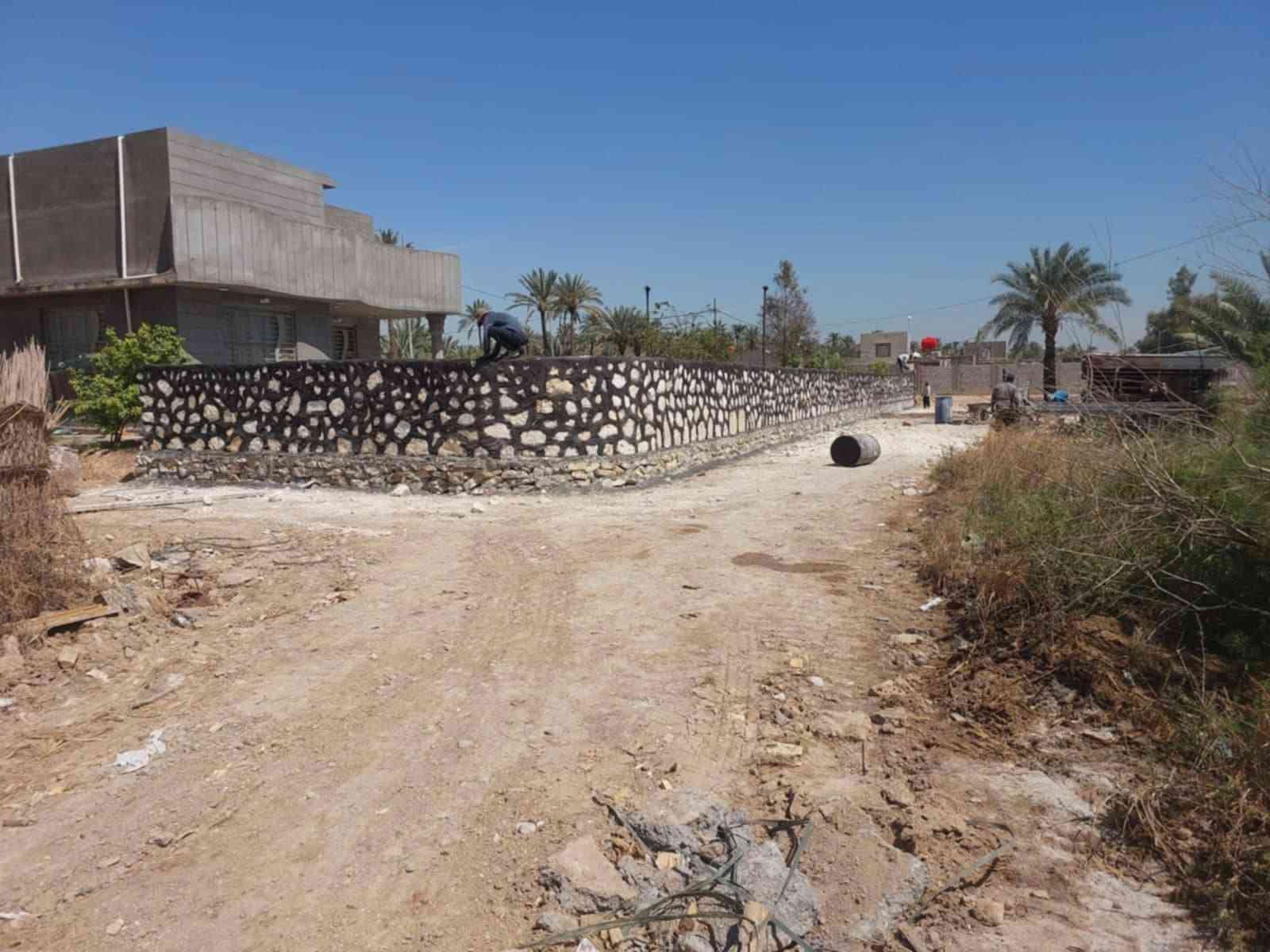 بناء • حجر • عمل