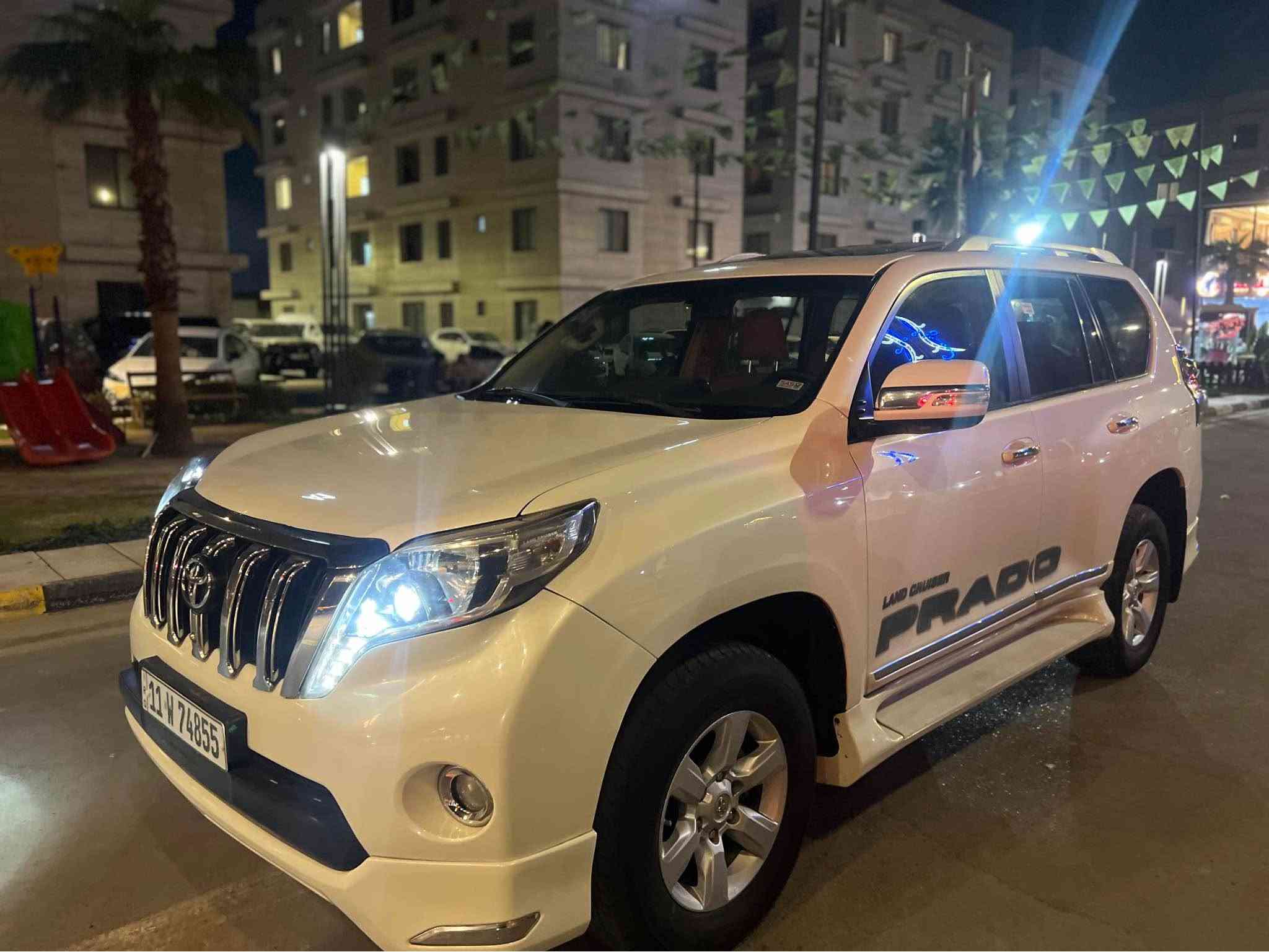 السلام عليكم برادو موديل ٢٠١٤ خليجي وكالة ساس مواصفات الفول المحرك والكير كفالة والسيارة مكفول من الصبغ والتبديل تخم تاير جديد ونظافة الغرفة ٩٥ ./. جاهزة من جميع النواحي 
فتحة سقف سلايت 
محرك ستة سلندر 
تبريد مركزي ثلاث قطع
فور ويل
سبعة راكب جلد
المقاعد الامامية كهرباء 
بصمة ابواب وتشغيل 
تشغيل عن بعد 

حساس امامي خلفي
سبير تعليك
هوك خلفي
اضاءة زنون
تحكم ستيرن
اشاير مري والمري شفط
مكانها بغداد وسعرها ٢٩٠ للاتصال 
*********** بغداد, العراق
