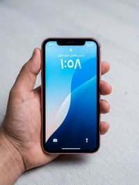 آيفون XR • وردي • بطارية مستبدلة