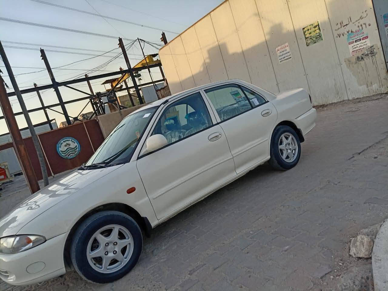 بروتون موديل 2004 بأسمي رقم بغداد الدولي مكينه وكير جدد صدر نضيف كهربائيات كلهه شغال  أ صبغ حسام بدون ضربه مكاني بغداد 48 السعر وبيهه مجال هذا رقمي ***********
