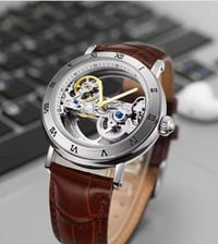 تصميم ميكانيكي مفرغ (Skeleton): تكشف لك سر حركة التروس والزمن بشكل فني...