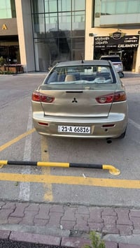 لانسر ٢٠٠٨ • أصفر • خليجي
