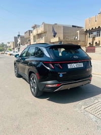 توسان امريكي موديل ٢٠٢٢ رقم بغداد فول اعلى مواصفات تمشي و ترجع بالبصمة...