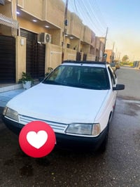 > سيارة بيجو روى موديل 2006 > المحرك والكير بحالة جيدة جداً > رقم بغدا...