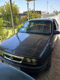 فيكترا ٩٢ • محرك مكفول • رمادي جويبة