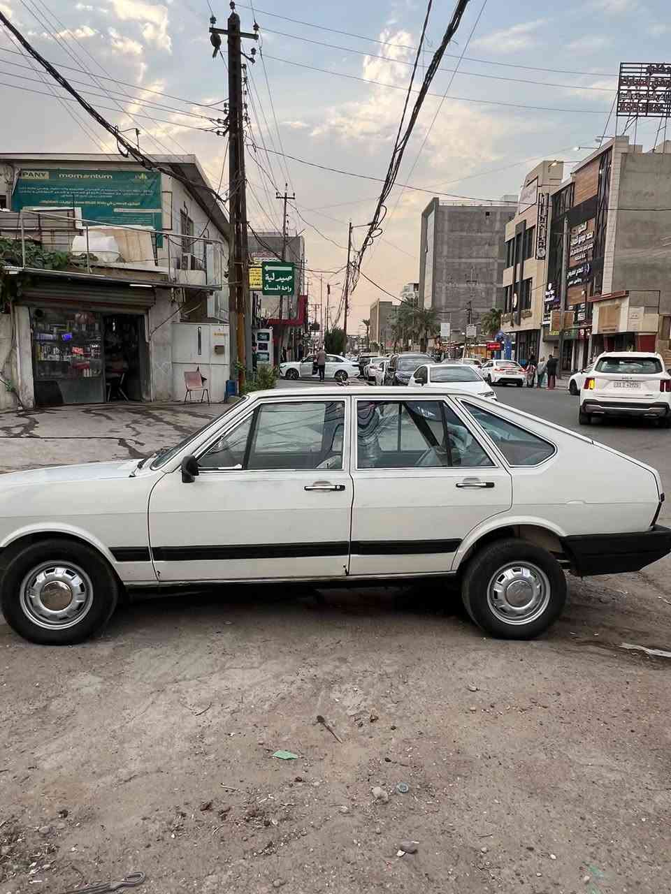 برازيلي ٨٧ • ابيض • رقم بغداد
