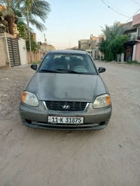 اكسنت • ٢٠٠٣ • كير عادي