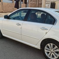كيا اوبتيما • ٢٠١٠ • مكينه ٢٠٠٠