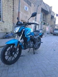 Rk200cc ماشيه بس 9 الاف وبيها دفتر ضمان دراجه زيرووو