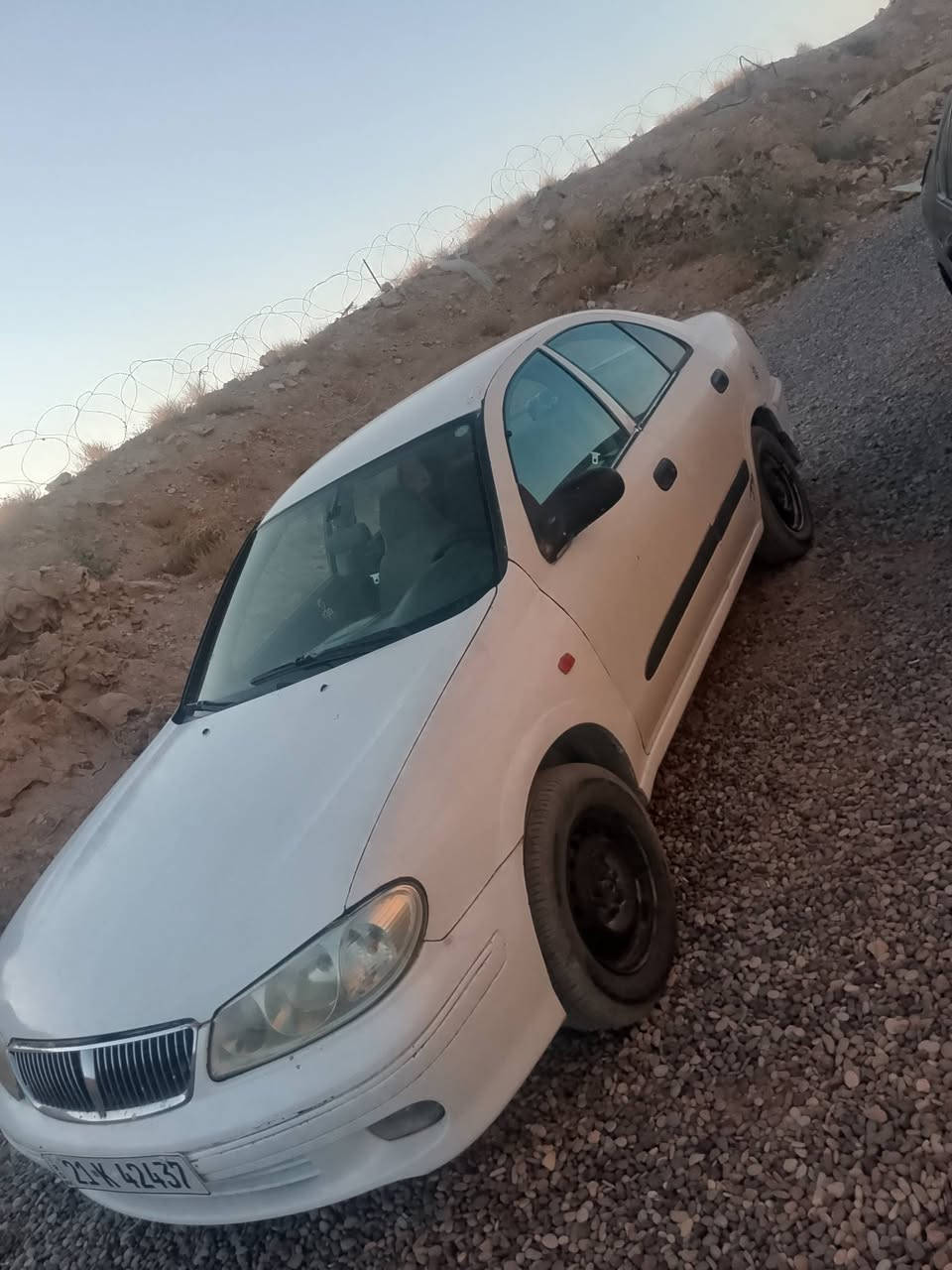 يلنيسان سني 2002 للبيع مابي كوبون  ضرر گدام خلف بس خفيف تبريد ثلج🥶🥶السعر 45 بي مجال قليل منان السياره كركوك(***********بي واتساب
