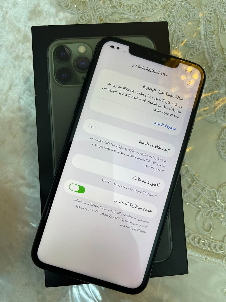 11 برو ماكس ذاكرة 256 لون زيتوني نظافة 100‎%‎ بطارية 100 دبل خط وياه الكارتونة مالتة مبدل شاشة وبطارية  فيس ايدي شغال السعر 275 الف بيه مجال بسيط مكاني بغداد الكرادة ***********

نص مكتوب في الصور:
- ٧:٠٦
- حول
- الاسم
- iPhone
- إصدار iOS
- 26.6.2
- اسم الطراز
- iPhone 11 Pro Max
- رقم الطراز
- MWF42CH/A
- الرقم التسلسلي
- سجل تاريخ القطع والخدمة
- الأغاني
- الفيديوهات
- الصور
- السعة
- ٢٥٦ غ.ب.
- متوفرة
- ٢٣٨,٠٢ غ.ب.
- عنوان WLAN
- D0:3F:AA:90:BA:65
- حالة البطارية والشحن
- رسالة مهمة حول البطارية
- غير قادر على التحقق من أن هذا الـ iPhone يحتوي على بطارية أصلية من Apple. قد لا تكون التفاصيل الواردة من هذه البطارية دقيقة.
- لمعرفة المزيد
- 100%
- الحد الأقصى للقدرة
- هذا قياس لقدرة البطارية مقارنة بقدرتها عندما كانت جديدة. قد تتسبب القدرة المنخفضة بتقليل ساعات الاستخدام بين عملية الشحن والأخرى.
- أقصى قدرة للأداء
- الـ iPhone غير قادر على تحديد عمر البطارية.
- شحن البطارية المحسن
- للحد من استنزاف عمر البطارية، يتعلم الـ iPhone من عادات الشحن اليومية، بحيث ينتظر ولا يتجاوز ٨٠٪ حتى يحين موعد حاجتك إلى استخدامه.