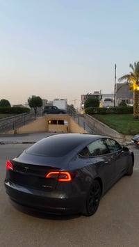 تيسلا مودل 3 2023 دبل ماطور لونك رينج  اون لاين  ماشية 31 الف  رقمها ب...