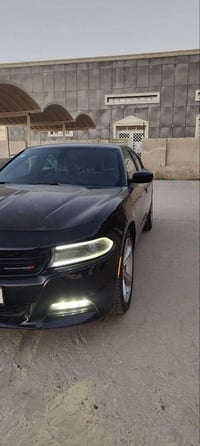 دوج جارجر  ٦ سلندر مكينه 3600 موديل 2015 2 ويل  حره رقم بغداد باسمي ال...
