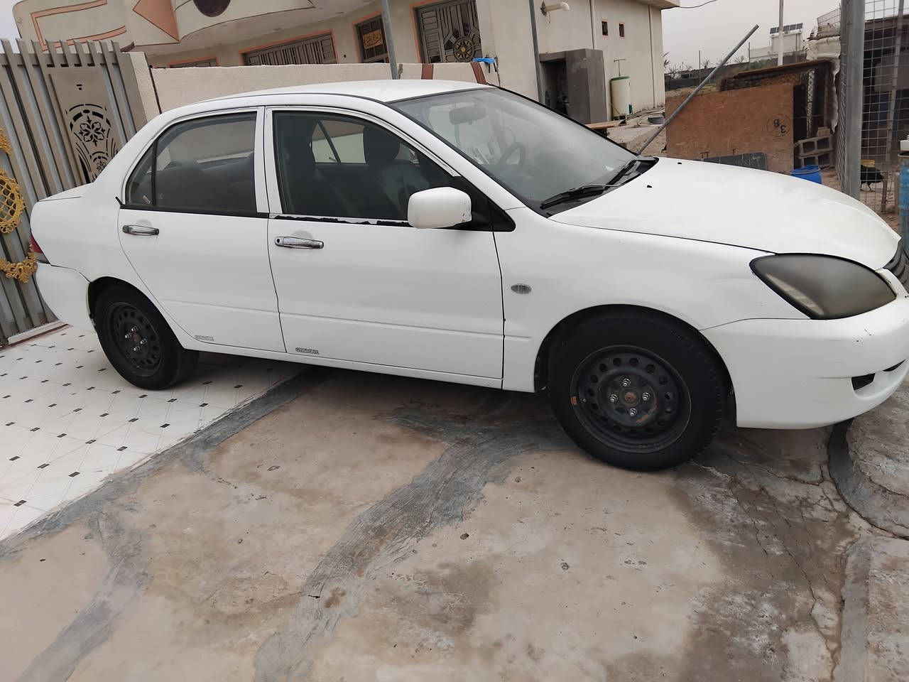 لانسر • ٢٠٠٩ • رقم بغداد