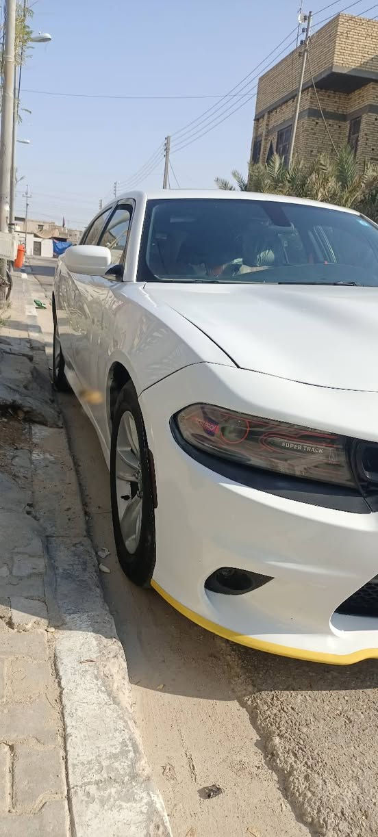 دوج جارجر 2019 اصل رقم بغداد موجودة بالبصرة بيها تبدیل جاملقات وبنيد شاصي ولغد وايرباك سليم وبيها بيبان مقسمات فقط تبريد ثلج تخم تاير جديد كشنات جلد حساس خلفي فتحة شاشة كار بلي سيارة جاهزة وكلشي ذكرتة الكم وبسعر مناسب 168 وبيها مجال ***********
