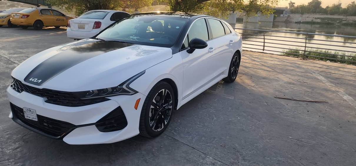 🚘 كيا K5     GT-Line 2023
السياره منفيس دخول جديد
اللون:  ابيض
الفئة: GT-Line فول مواصفات
المحرك: 1600 CC تيربو
الحادث: خلفي خفيف تبديل دعامية خلفيه 
الكشنات: احمر 

المواصفات:
بانوراما
بصمة تشغيل وتشغيل عن بعد
شحن هاتف لاسلكي
قيادة ذاتية على الخطوط السريعة
هاند بريك بصمة
مثبت سرعة
ABS ومانع انزلاق
حساس ضغط الإطارات
بك لايت LED
شاشة مع خرائط ملاحة
كاميره دوارة
رادارات جانبية ومراقبة النقطة العمياء
رادار الخطوط البيضاء
إشارات بالمرايا
لايتات 3 عدسات
أوضاع قيادة Eco / Sport / Smart / Normal
بلوتوث + USB + AUX
تحكم ستيرن كامل
كير أوتو + عادي
أوتو بريك
ستيرن LED D
زينون
توقف ذاتي عند الرجوع
صندوق بصمة

📍 المكان: بغداد الكاظمية
  ***********
***********
