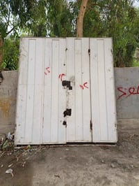 باب دفتري • حديد ثقيل • سلم حديد