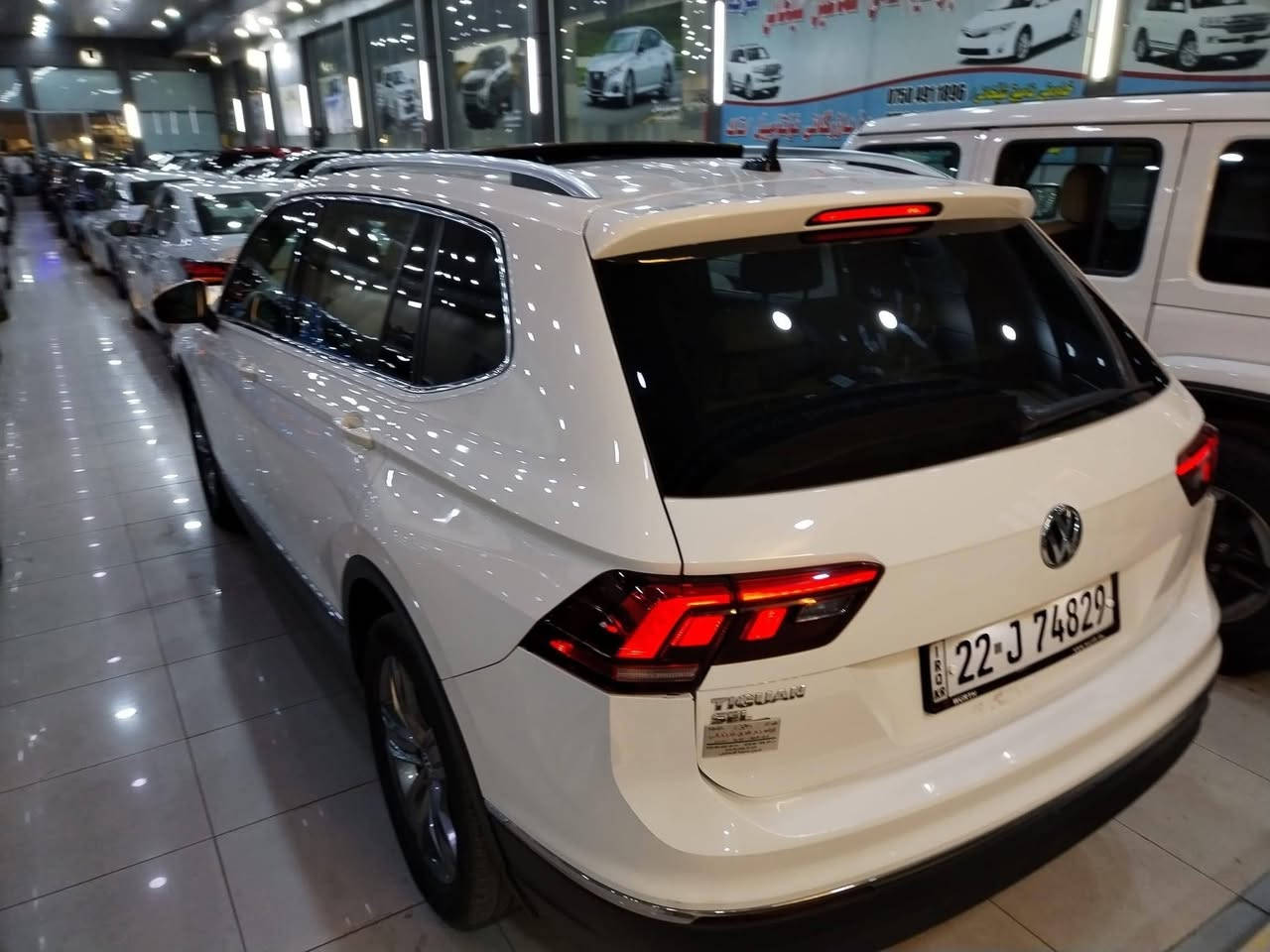 فولكس واكن تيكوان موديل 2020 

عدد المقاعد (  7  )

عداد المسافة : 80  ml

حجم المحرك : 2.0L TURBO ( 4 سلندر 

المواصفات :sel  
فول بانوراما 

كيج الكتروني 
 ابواب بصمة
بصمة تشغيل 
تشغيل عن بعد (Remote Start)
شاشة دشبول ديجيتال
شحن وايرليس
كاميرة
‏‎تحديد سرعة
اوتو ستارت Auto Start
اوتو ستوب Auto Stop‎
رادار جانبي  (نقاط عمياء)
رادار خلفي (التحذير من الاصطدام)
حساسات امامي
حساسات جانبي 
حساسات خلفي 
نظام : Eco
نظام : Normal 
نظام : Sport
كشنات جلد
كشنات كهربائي
كشنات دفئة
تبريد لمس
تبريد مركزي 
لايتات ليد عدسة زينون بيلادي
بكلايتات ليد بيلادي 
ويل كروم
بعد هواي مواصفات… رقم اربيل بااسمي 
العنوان  دهوك / عقرة
‏‎للاستفسار اكثر الاتصال علی هذا الرقم 
***********
***********
