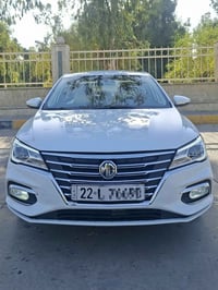 للبيع MG5 2023 لون ابيض ماشيه 49 الف كير اوتماتيك صار بيها طخه خفيفه ب...