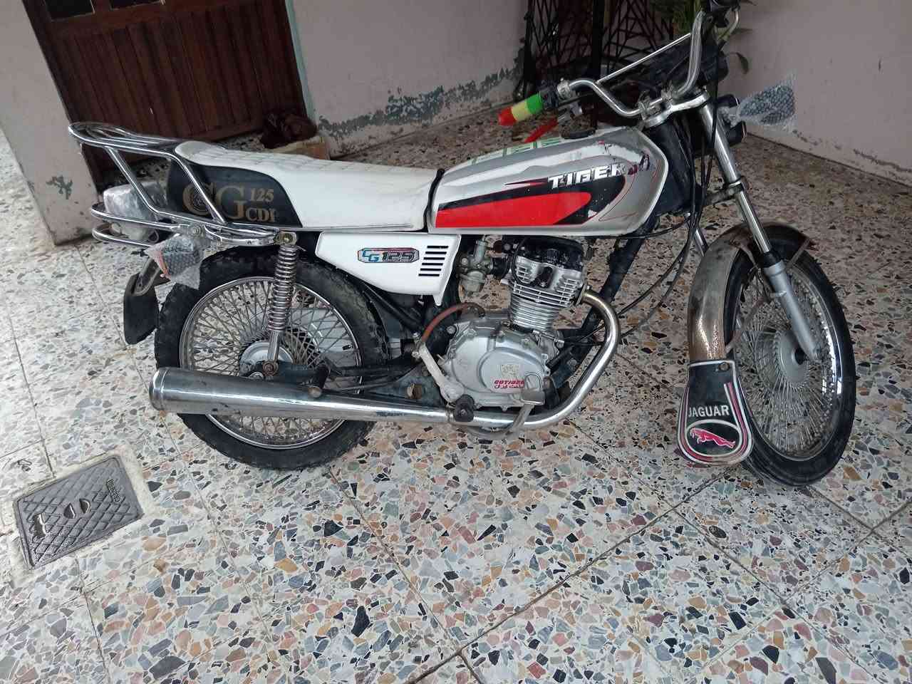 ماطور تايكر موديل ٢٠ للبيع حيل نضيف ربع ماا تصرف   علي تواير جدد كلشي بي نضيف محرك شرط تكف يمو ماتسمع حس سعر400 وبي مجال حك جيتك  مكاني ايسر *********** وتساب.              ***********
