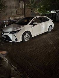 كورولا  هايبرد موديل 2025 ماشه 15000للبيع مكفوله من صبغ 158 تصال 07727...