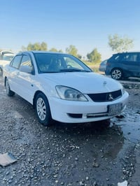 لانسر • ٢٠١١ • اوتوماتيك
