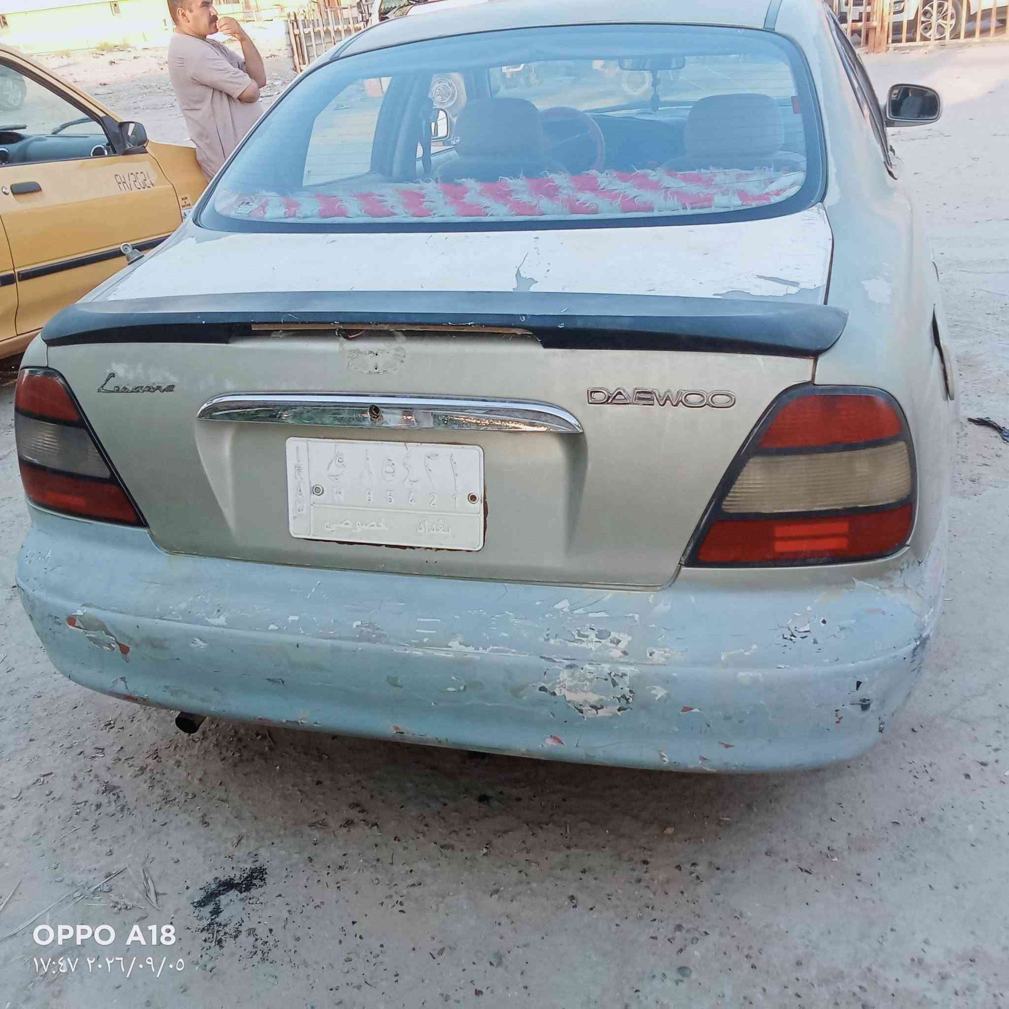 سيارة دايو لگنزا موديل 99 محركها محور گير ومكينه كورلا رقم بغداد مالك السيارة نجف ناحية العباسية مكان السيارة نجف ناحية العباسية 
السعر 20 ورقة وبيها مجال 
للاستفسار الاتصال 
***********

نص مكتوب في الصور:
- OPPO A18
- ١٧:٤٧ ٢٠٢٦/٠٩/٠٥
- ١٧:٤٦ ٢٠٢٦/٠٩/٠٥