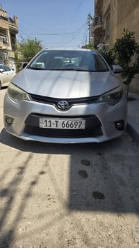 سياره كورلا مديل 15 وارد أمريكي حادثه جاملغ وبنيد وبيه قطعتين صبغ كلير...