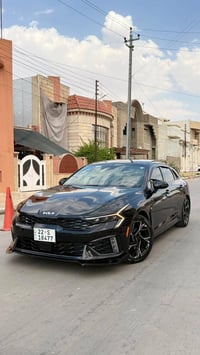 كيا K5 GT-Line 2025  فول مواصفات، داخل احمر ماشية 30,000 ميل  جام اسود...