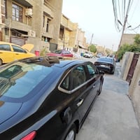 / نيسان سنترا 2013 اسود رقم بغداد امريكي محرك  2000  بيها بنيد وجاملغ ...