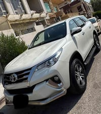 Toyota fortuner 2016 دبل اکسل  ٤ سلندر ٢٧٠٠  رقم اربیل  تبرید ثلج  سیا...