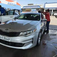 سياره اوبتيما وارد أمريكي ضررها موضح في الصور بسيط جدا بدون ايرباك بيه...
