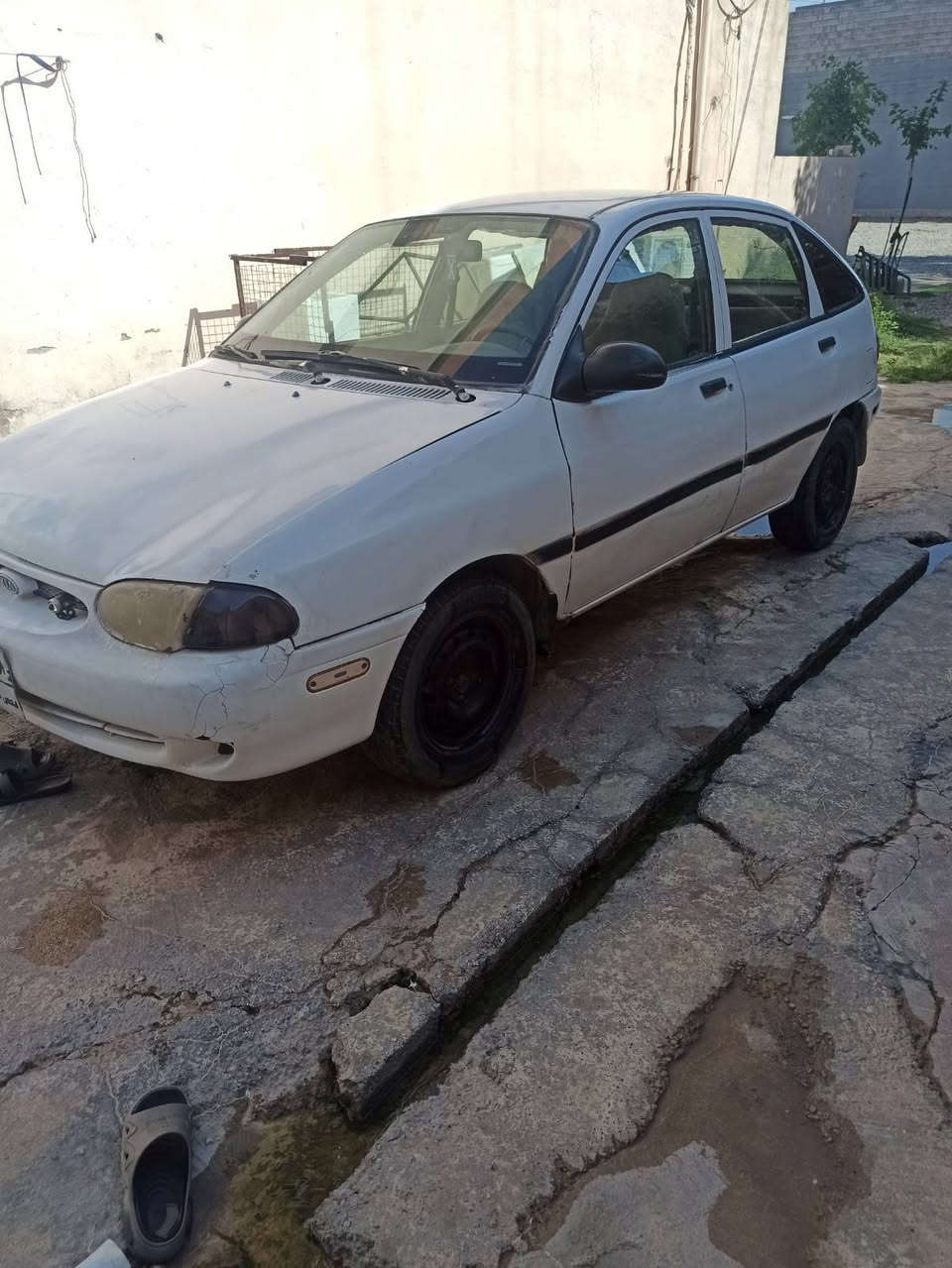 كيا موديل ١٩٩٧  كير اوتوماتيك مكينة مازدة كير و مكينة بة شةرت سنوي و رقم و واجهة و باكانة لة كةلية اصلي بي مشكله و بي عيبة لة هةوليرة سيارةكة تلفون  *********** واتساب أربيل, العراق
