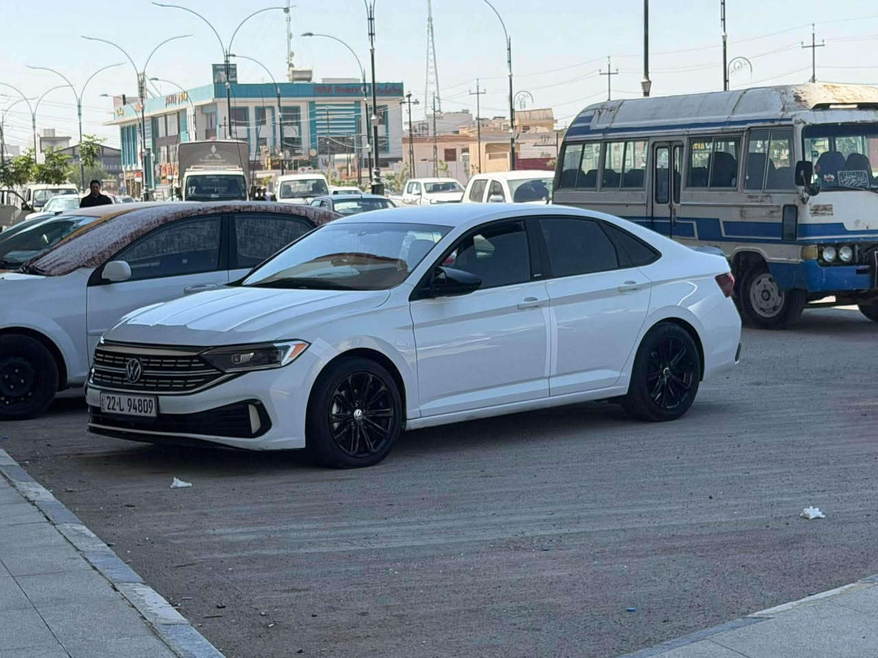 Volkswagen jetta 2023 s 
3VWAM7BU1PM006346 رقم شاصي 
كوردى///عربي 

ملاحظة : كير عادي 
المواصفات: فئة S 🔺
المميزات:
بصمة تشغيل
شاشة عدادات إلكترونية (جيج ديجيتال)
حسّاسات دائرية 360 درجة
شاشة وسطية
جير عادي (ناقل حركة يدوي)
نظام قيادة اقتصادي (Eco)
إضاءة LED مع عدسات وزينون 🔹
المحرك: 1.5 توربو 🚀
الحالة والبدي: قطعتان وجزء صغير من البونيت (غطاء المحرك) بها بويا (رش)، بدون أي دواخل أو ضرر في الهيكل الأساسي.
الأمان: الأرباج (الوسائد الهوائية) مفتوحة ☄️
الضمان: الجير، المحرك، التوربو، الرادياتير، والحمايات بحالة ممتازة وعلى الشرط 💥
مكان سيارة كركوك 
***********
جیتا مۆدیل 2023 ❄️

تێبینی گێڕ عادیە❗️❗️❗️❗️

مواسفات S🔺

بریک بەسمە ـ گیچ ئلکترۆنی ـ 360 دەرجە حاسە

شاشە وەسەت ـ گیر عادی ـ Eco - لایت لئد و عدەس و زینۆن ـ گیر عادی ـ🔹

مەکینە 15 Torbo 🚀

۲ پارچەو و پەلەیک لەبۆنیتەکەی  بۆیاخە بێ ناو گرتن

پەرشوت سیستەم کراوە ☄️

گیر و مەکینە و تۆربۆ رادیتەر و حماوەی بەشەرت💥
شوێن کەرکوک 
*********** أربيل, العراق

