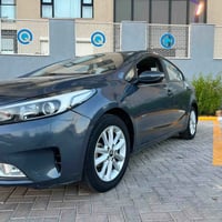 كيا سيراتو موديل 18محرك 1600 بيها قطعتين صبغ جاملغ خلفي وباب خلفي وقبق...