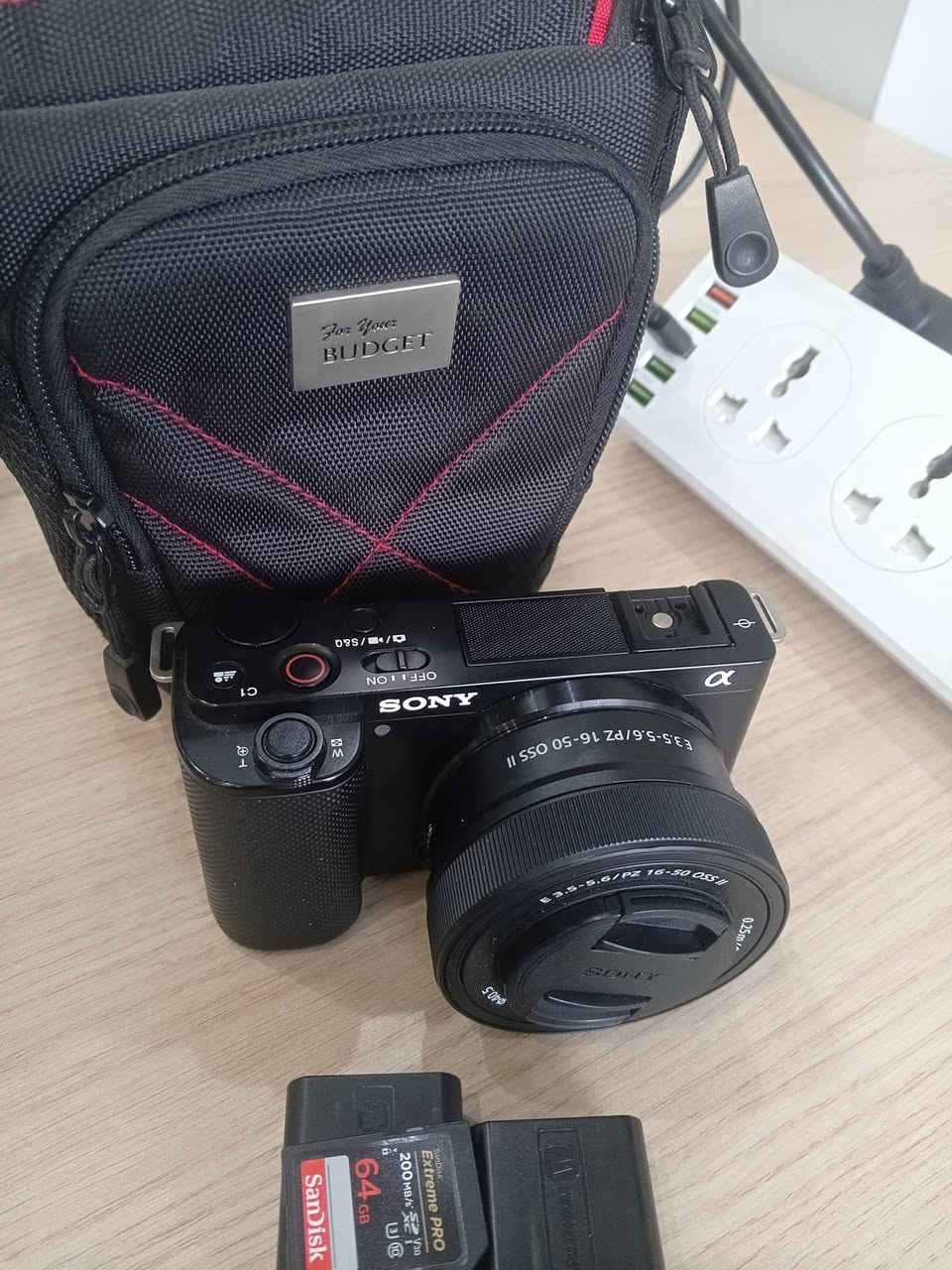 📸 **للبيع | Sony ZV-E10**

كامرة **Sony ZV-E10** بحالة ونظافة **جيدة جداً**، استخدام شخصي لمدة **9 أشهر فقط**.

**التفاصيل:**
• Shutter Count: **1,716 لقطة فقط**  
• عدسة **Sony 16-50mm**  
• **بطاريتان**  
• الكارتون الأصلي
رام 64 مع حقيبة هدية 
• جميع الملحقات متوفرة  
• الكامرة نظيفة ومحافظ عليها

مناسبة جداً لتصوير **Reels – Content – Photography – Video**.

**سبب البيع: الترقية إلى كامرة أعلى.**

📍 **بغداد**  

للتواصل: خاص أو على الرقم **[***********]**

نص مكتوب في الصور:
- CAMERA SHUTTER COUNT Find out how many shots your Digital SLR has taken RESULTS Shutter count 1716 SONY ZV-E10 Current value on eBay As an eBay Partner, this site may be compensated if you make a purchase using the above link X Post If you found this useful and love cameras, check out our new desktop app! CHECK ANOTHER CAMERA Digital Photo Gallery
