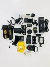 نيكون D7100 • عدسة 18-140 • فلاش GODOX
