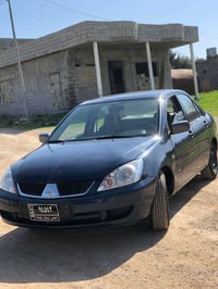 لانسر 2004 • جير عادي • دربندخان