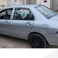 لانسر ٢٠٠٨ • رقم بابل • مكفولة حادث