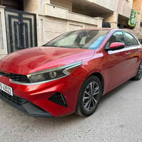 كيا فورتي 2023 رقم بغداد جديد محرك 2000دوش رادار امامي شاشه كار بلاي ٣...