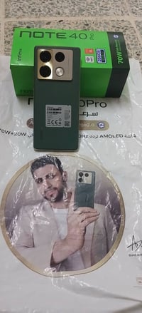 نوت ٤٠ برو • مامفتوح • شاحن ١٢٠ أصلي