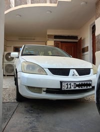 لانسر ٢٠١1 • تنقيص بالمكينة • يحتاج راديتر