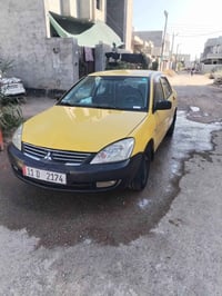 لانسر • ٢٠١٠ • مكينه ٢٠٠٠