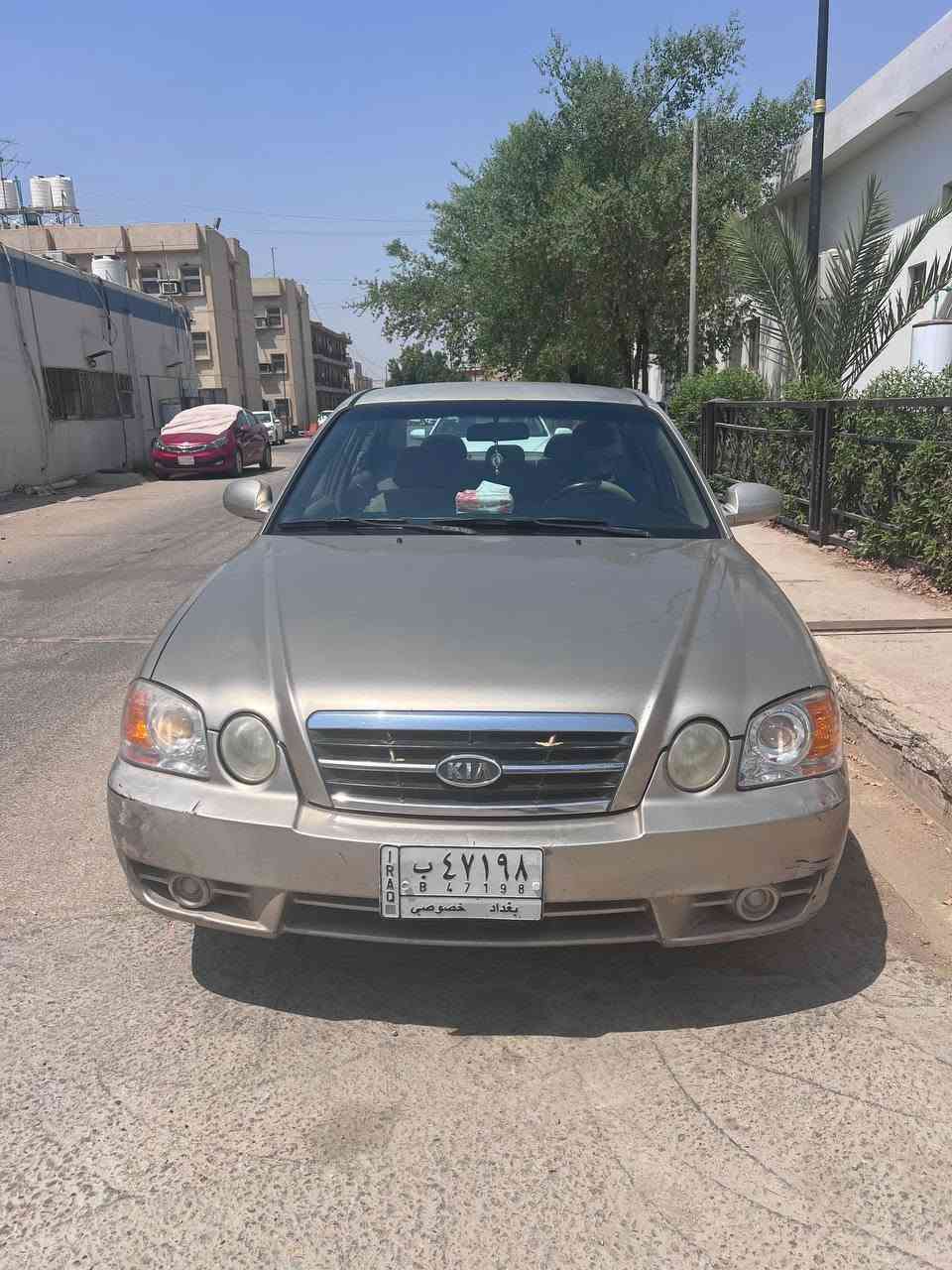 من النوادر في العراق
سابقا متروكة ٧ سنوات وعلى ايد مالك واحد 
اوبتيما 2006 مكفولة كفاله عامه من اي حادث 
وما مصبوغه لا حزام ولا عام 
ماشيه ١٨٠ حقيقي بيها كتلوك وسبير الوكالة 
حتى دعاميات بدون صبغ 

مكينه ٤ سلندر دوش مكفوله وكير مكفول 
وتبريد ثلج بدون نقص حتى الحداديه جديده 
كلشي شغال بيها وبلادي مثبت سرعه 
سيارة قويه واعتماديه وغراضها بفلس ونص 
السعر ٦٣ وبيها مجال للعلم مصبوغات عام اكثر من سعرها
عنوان ديوانيه 
***********
