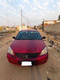 لانسر ٢٠٠٧ • رقم بغداد • مصبوغة