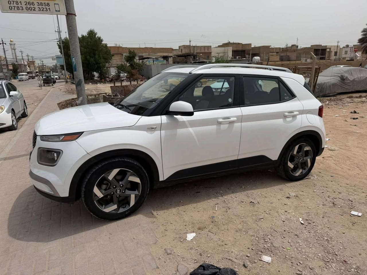 هونداي فيو موديل 23 

دخول جديد منفيست بإسم تحويل مباشر 

((حادثه باب وجاملغ ولبنيد مصلح نفسيته  بدون اي دواخل لغود شواصي براكيت تبريد كير محرك شركة ايرباك استيرن فقط شرط ع الفحص)) 

          المواصفات 

محرك ((1600))  ((50000)) مايل تنفس طبيعي 

رادارات أمامي وخلفي وجانبي ونقطة عمياء وأشاير بالمري 

ويلكب تو ويل الرقم ايكلفك أقل من ((15))ورقة 

فتحه سقف

فول تحكم استيرن 

وباقي المواصفات معروفة 

مكان السيارة بىالنجف الاشرف

السعر ب ((115)) وبيه مجال  ***********
***********واتساب

نص مكتوب في الصور:
- ***********
- ***********