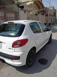 ٢٠٦ بلس • ٢٠١٢ • بدون صبغ
