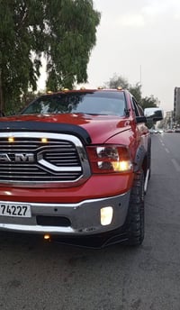 رام 1500 • احمر طماطة • باب طويل