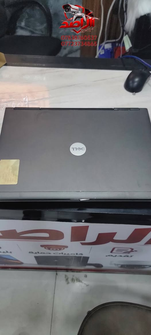 ديل D630 • منفذ COM • شاحن أصلي